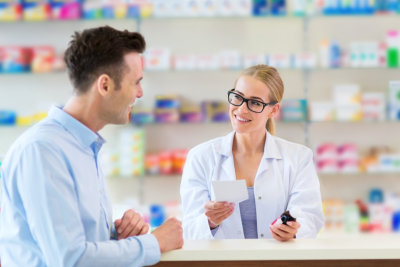 pharmacist and client at pharmacy